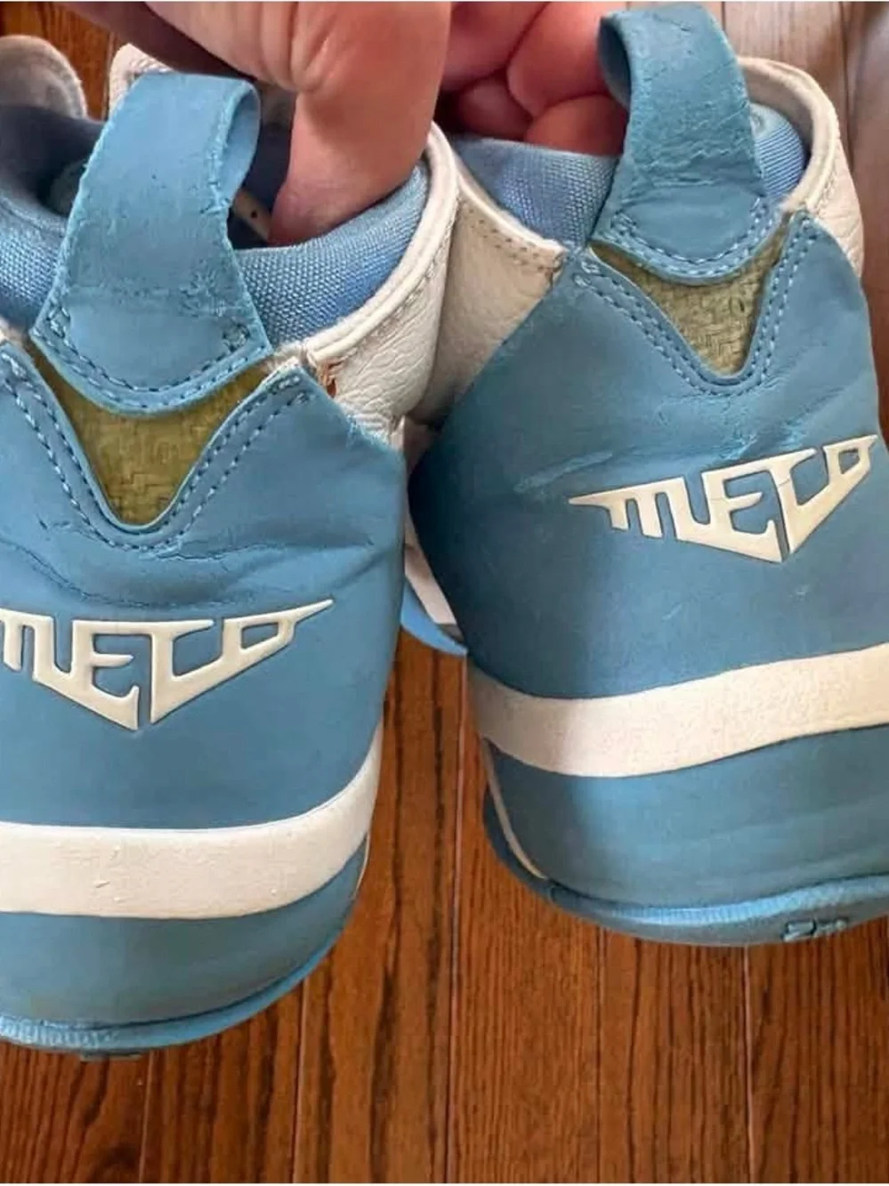 Jordan White with Light Blue High-Top Basketball Sneakers